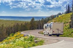 Scenic photo of RV on country road